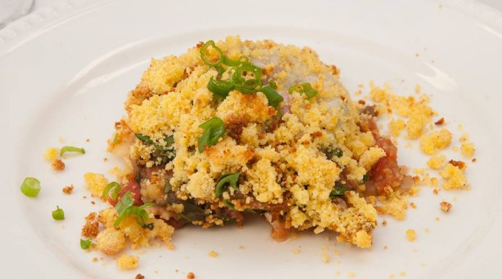 a close up of a plate of Baked Red Bean Past with Cornbread Crumble