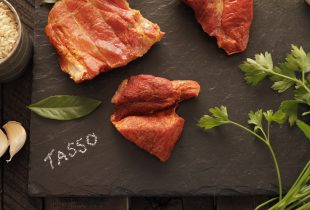 Tasso on board with rice and bay leaf