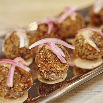 a close up of jay ducote's red beans and rice balls