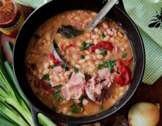 Cooked great northern beans with ham dish