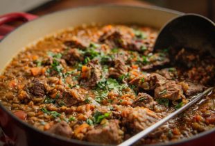 a pot full of beef lentil stew