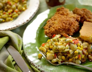 a plate of succotash fried chicken
