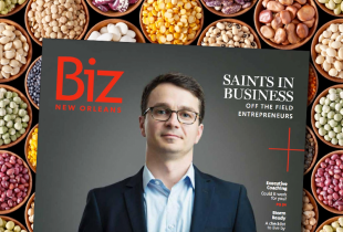 a graphic showing the cover of biz new orleans behind a bunch of beans