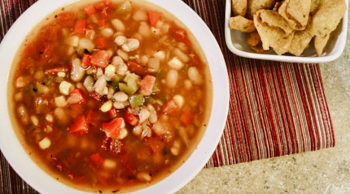 a bowl of southwestern pinto bean soup