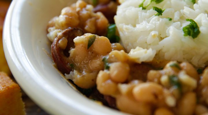 a close up of south louisiana style white beans and rice