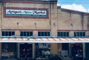 Artigue's Abita Market storefront and sign