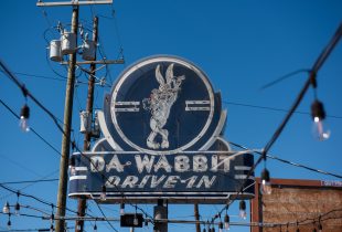 cafe 615 da wabbit drive in flourescent sign in new orleans
