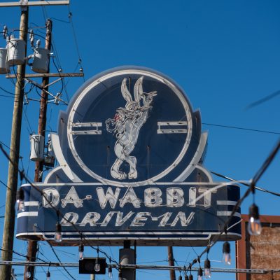 cafe 615 da wabbit drive in flourescent sign in new orleans