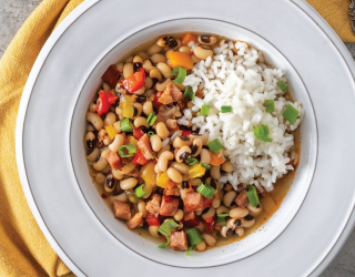 a bowl of Classic Hoppin’ John with black eyes and a side of rice