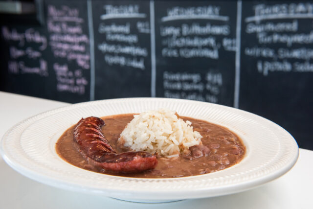 Plate of red beans and rice with smoked sausage