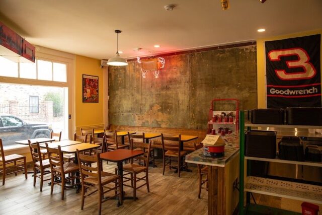 Inside of Hot Stuff dining area. Chairs and tables